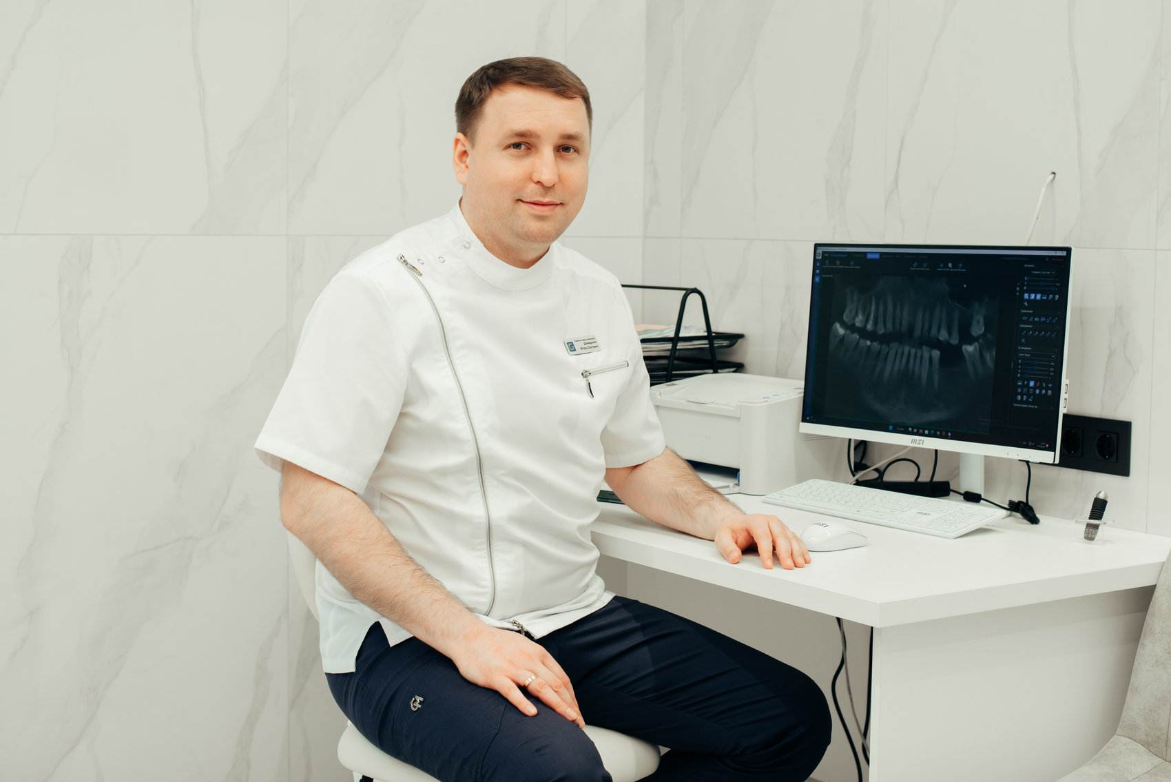 Демиденко Игорь Олегович планирует операцию All-on-6 по КТ-снимку — стоматолог-имплантолог клиники Giddent в Тюмени